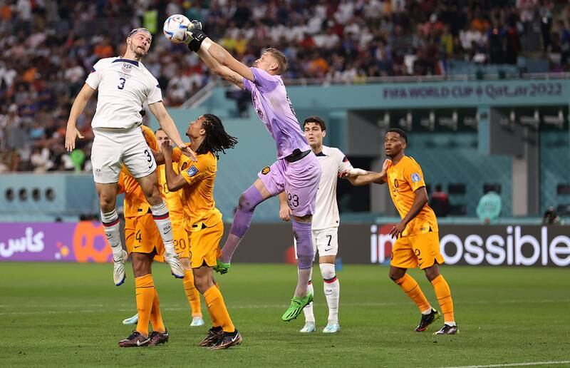 Walker Zimmerman of United States goes for a header with Andries Noppert of Netherlands during the FIFA World Cup Qatar 2022 Round of 16 match between Netherlands and USA at Khalifa International Stadium. Getty Images