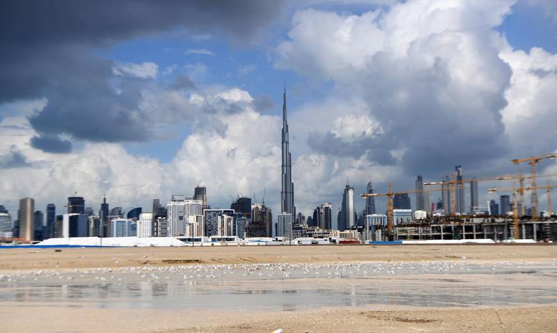 Dark clouds over the skyline of Dubai with Burj Khalifa, the world’s tallest building. AFP
