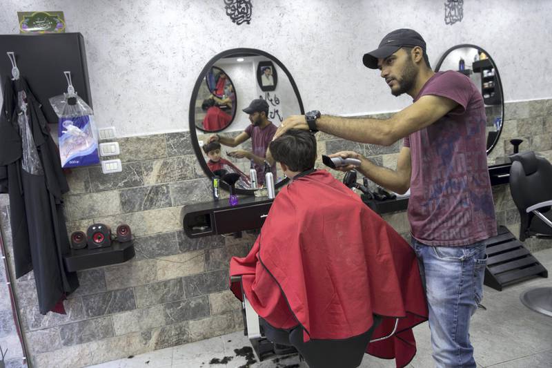 Musa Masarwa, 27, a barber in the Jelazoun Refugee Camp who was recently released from two years in prison for what he vaguely termed "security things against Israel". (Photo by Heidi Levine for The National).