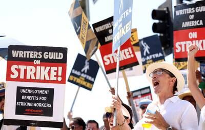 Sag-Aftra actors and Writers Guild of America writers on a picket line outside Paramount Studios in Los Angeles, California. Reuters