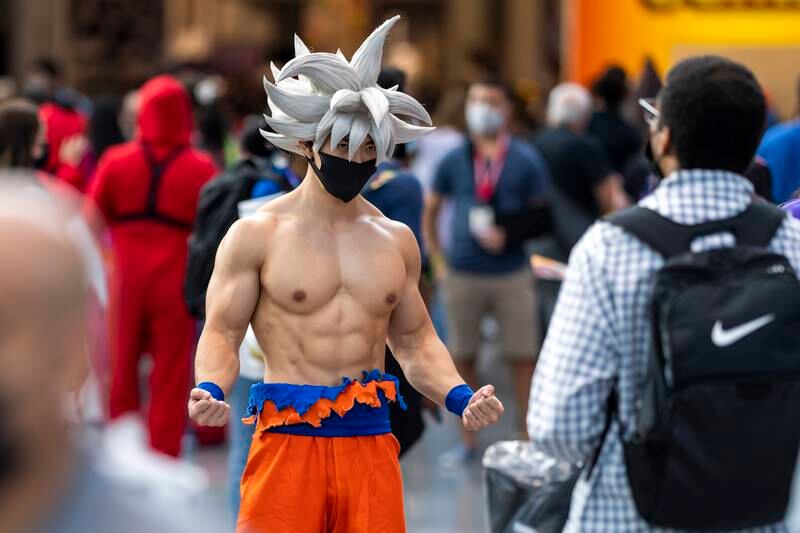 An attendee dressed as a character from 'Dragonball Z' poses during New York Comic Con. Charles Sykes / Invision / AP