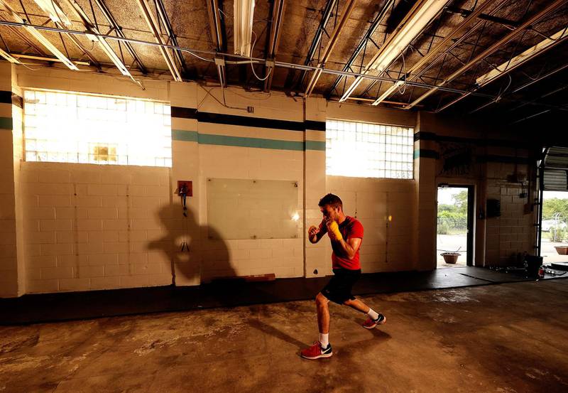 Three time New York Golden Gloves boxer Anthony Lopez shadowboxes during a workout at Jetty gym on Thursday, July 30. AFP