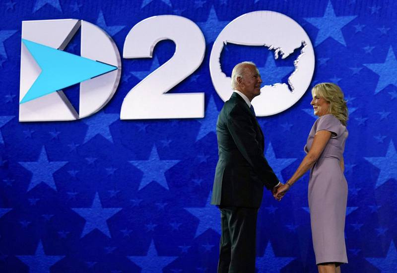 Joe Biden and Jill Biden stand on stage after he accepted the Democratic Party nomination for US president. AFP