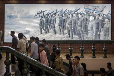 A Korean People's Army propaganda poster  at a museum in Sinchon, south of Pyongyang. Ed Jones / AFP Photo / July 29, 2017