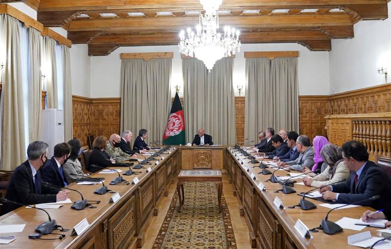 Afgan President Ashraf Ghani, center, meets with US Secretary of State Antony Blinken, center left, and their delegations at the presidential palace in Kabul. AP