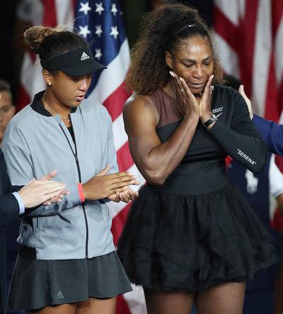 Naomi Osaka and Serena Williams during the US Open trophy ceremony. EPA