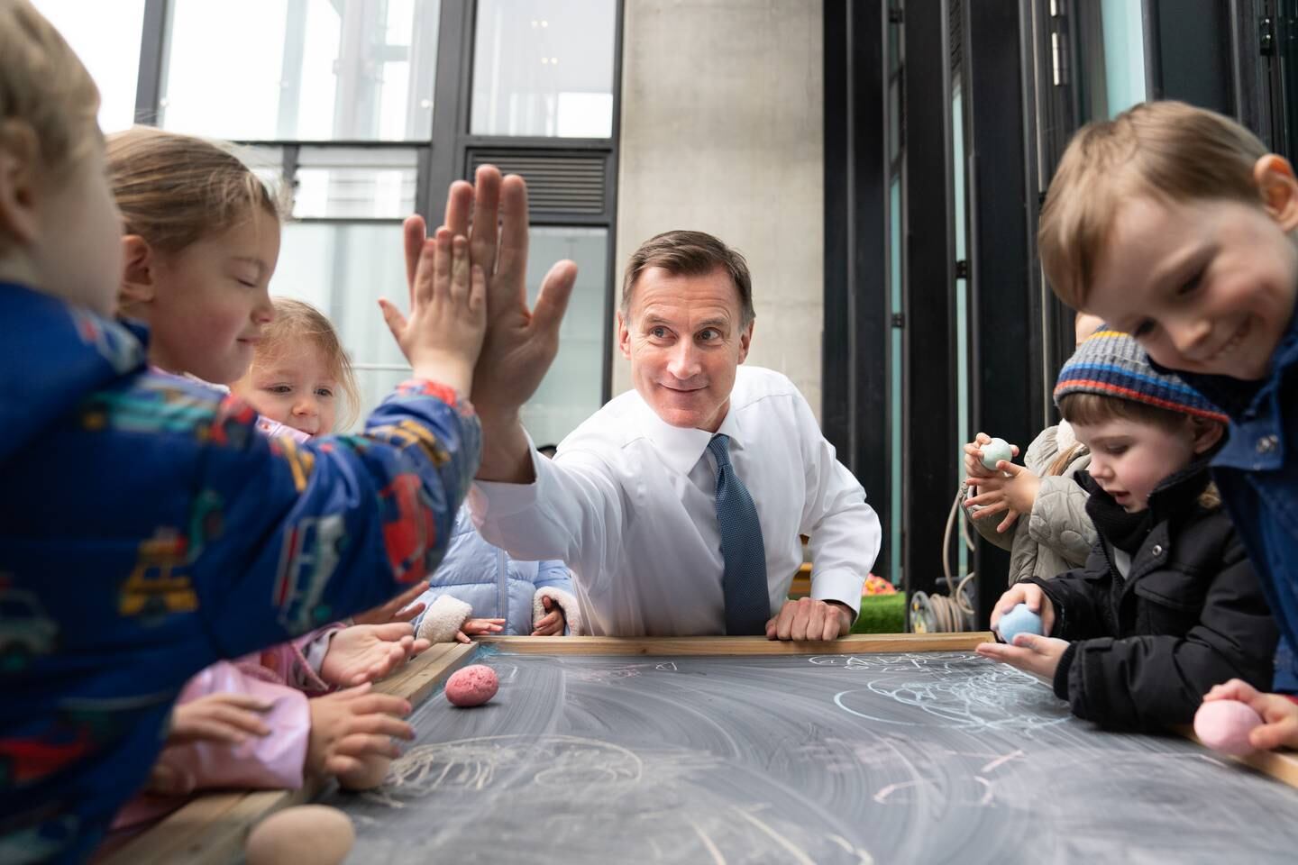 Chancellor of the Exchequer Jeremy Hunt during a visit to Busy Bees Battersea Nursery in south London. Getty Images