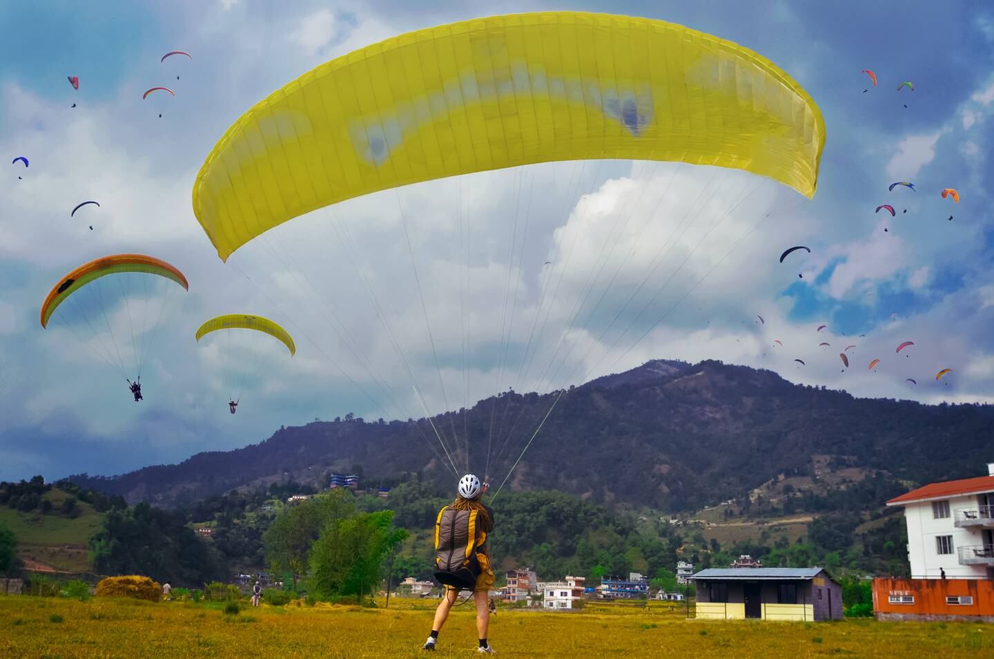 Paraglide above the Himalayas with a half-term adventure in Nepal. Photo: Trekkup Dubai