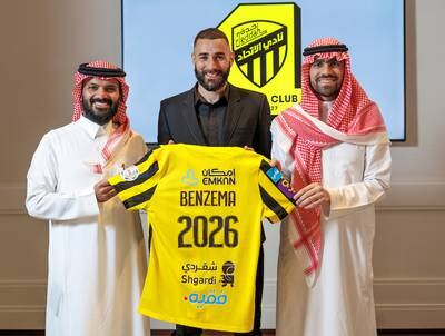 France striker and current Ballon d’Or holder Karim Benzema with Al Ittihad club officials after he agreed to join the Saudi Pro League champions on an initial three-year deal. Photo: Al Ittihad Club