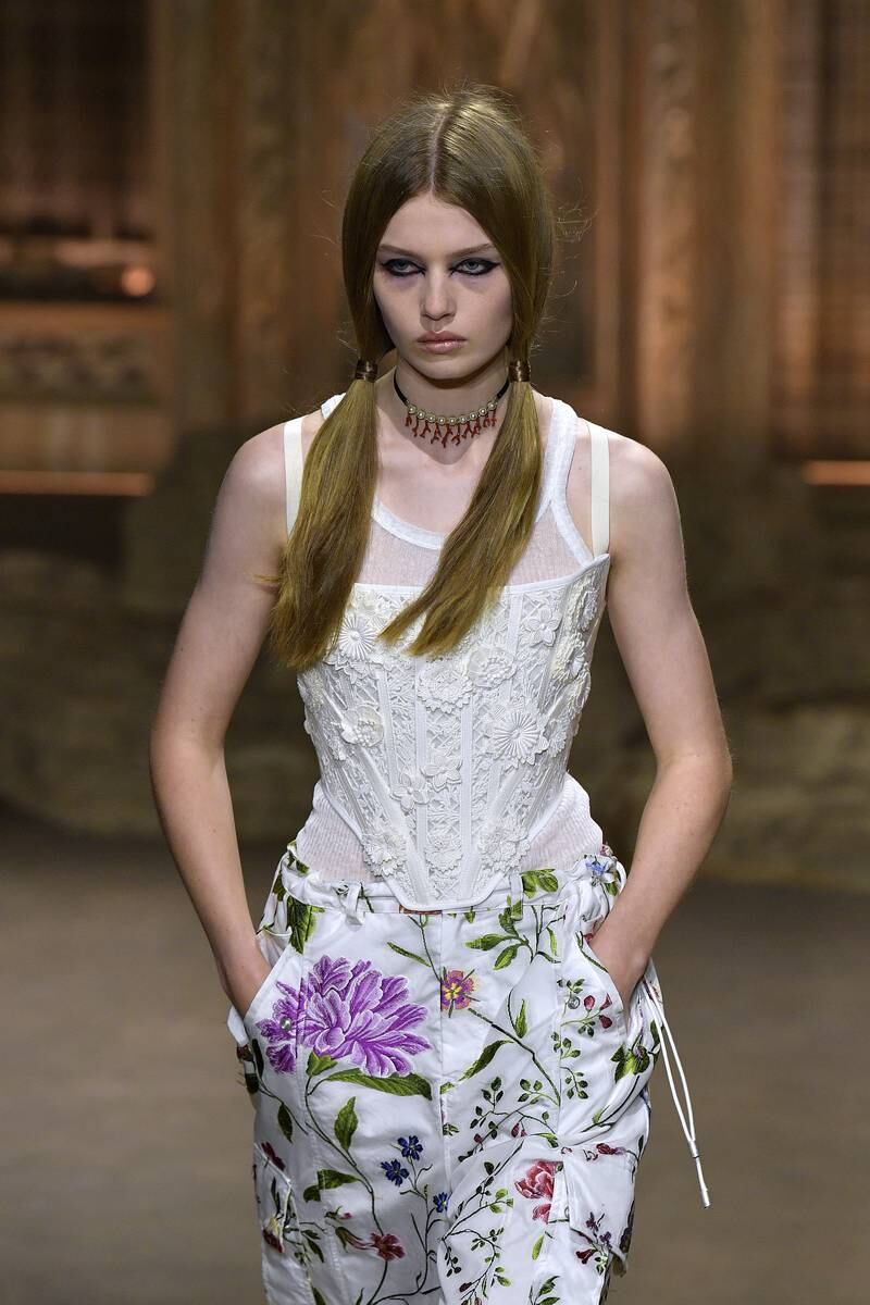 A stomacher corset with floral trousers at Dior spring/summer 2023. Getty Images