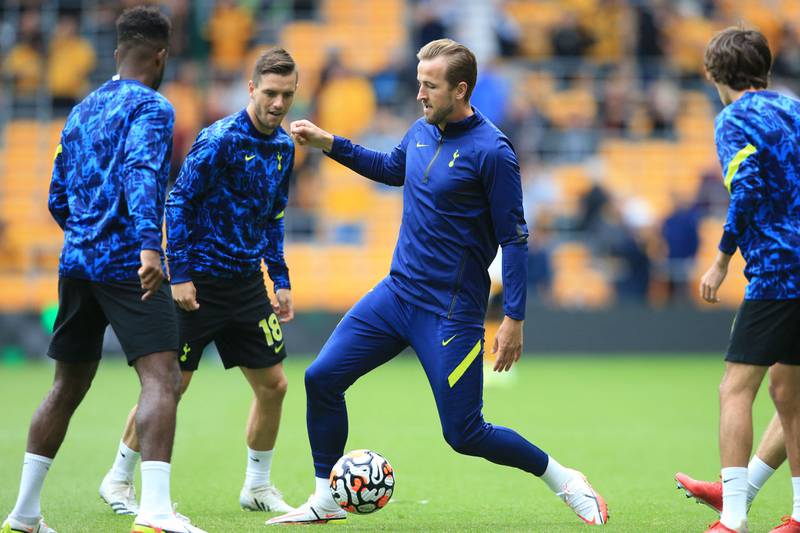 Harry Kane warms up with teammates at the Molineux Stadium. AFP