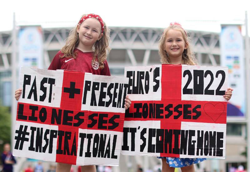 England fans Gracie May, 8, and Amelia Lee, 6 pose on Wembley Way. PA