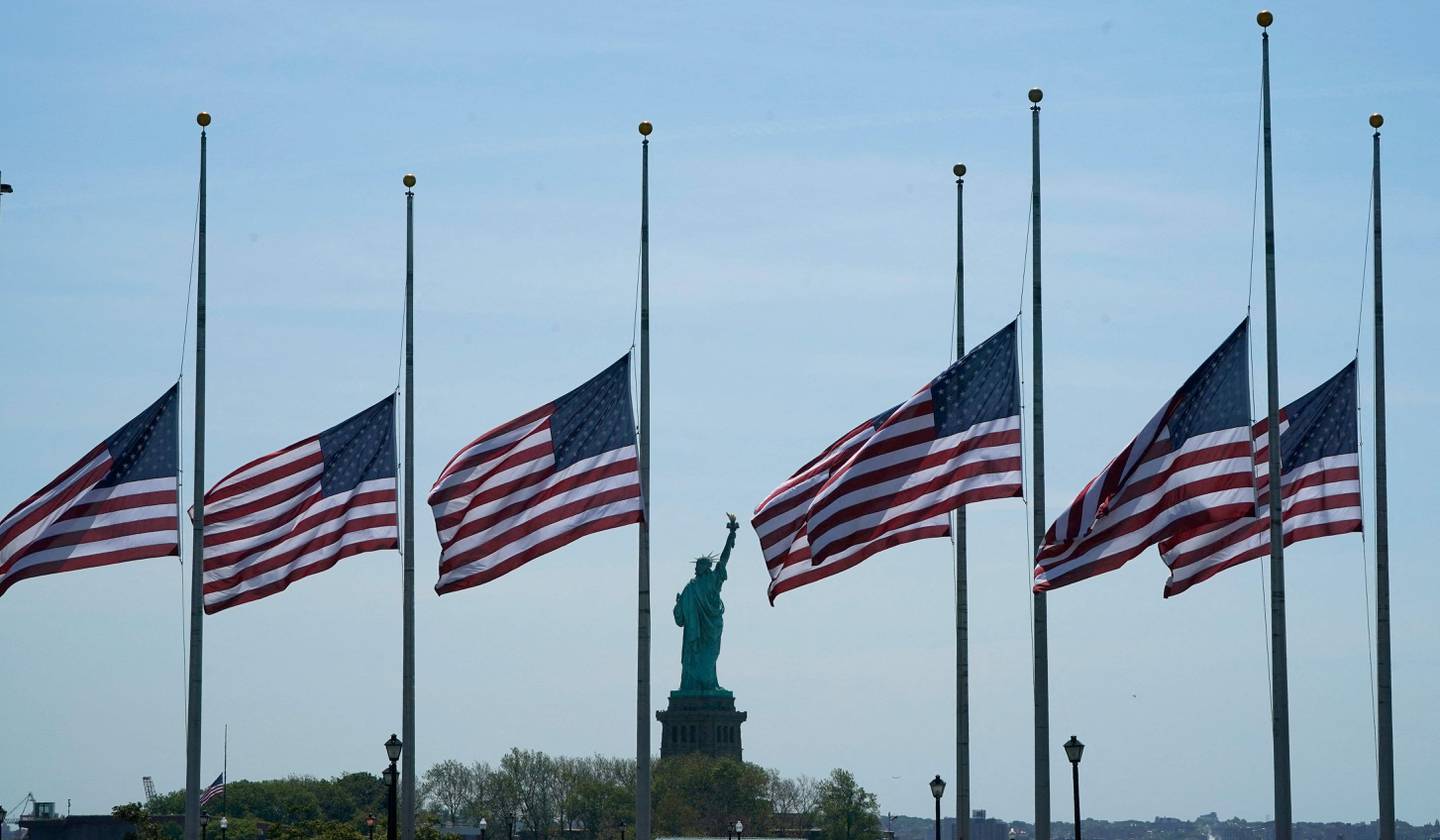 US flags fly at half-staff in New York City after the shooting. AFP