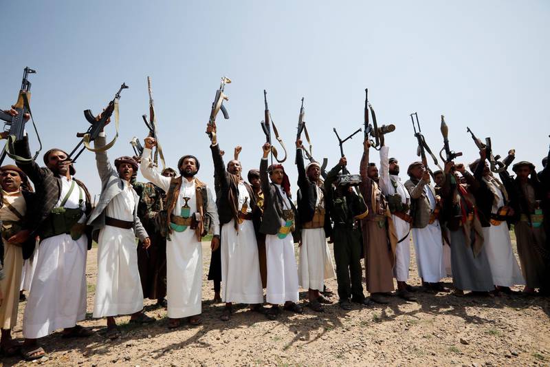 epaselect epa08618102 Armed supporters of the Houthi movement hold up their guns while shouting anti-Israel slogans during a protest against the peace agreement to establish diplomatic ties between Israel and the United Arab Emirates, in Sana’a, Yemen, 22 August 2020. Israel and the UAE reached an agreement to fully normalize relations. Many are against the agreement between the UAE and Israel, as they consider it breaks a consensus between Arab countries not to formalize diplomatic relations with Israel before the establishment of the Palestinian state.  EPA/YAHYA ARHAB