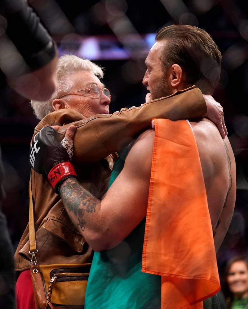 MMA Mixed Martial Arts - UFC 246 - Welterweight - Conor McGregor v Donald Cerrone - T-Mobile Arena, Las Vegas, United States - January 18, 2020 Conor McGregor with Jerry Cerrone, grandmother of Donald Cerrone after the fight REUTERS/Mike Blake