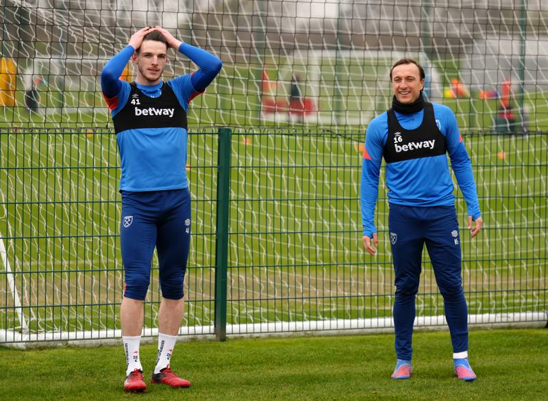 Declan Rice, left, and and Mark Noble during a training session at Rush Green. PA