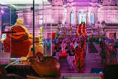 Mahant Swami Maharaj watches the dancers perform at the Akshardham temple. AFP