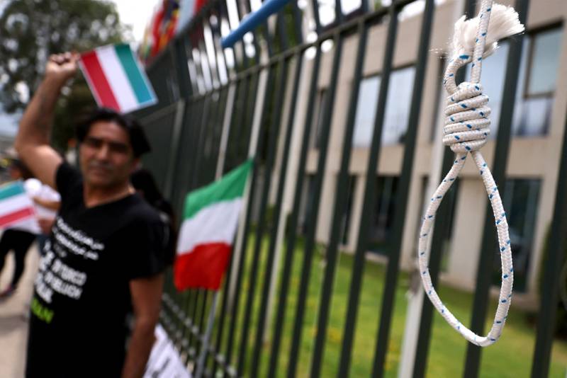 A noose hangs from mock gallows as Iranians in Chile protest outside the UN headquarters in Santiago against the hardline regime in their homeland. Reuters