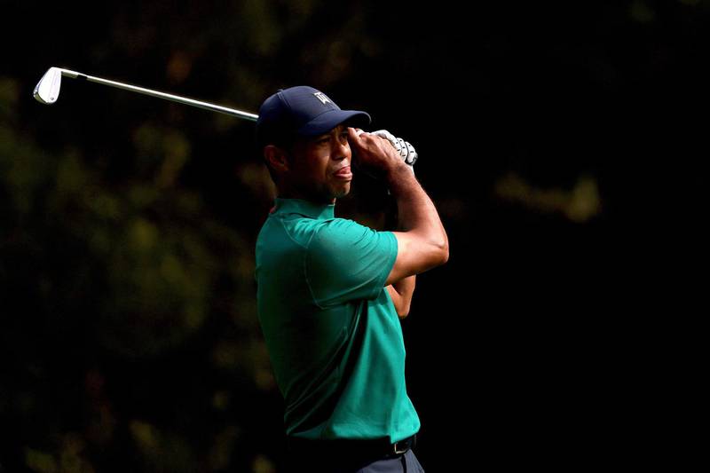 Tiger Woods plays a shot during a practice round prior to the Masters at Augusta National Golf Club. AFP