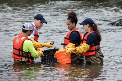 Britain's Prince William, Prince of Wales examines oyster samples in the East River with students in Brooklyn, New York on September 18, 2023. Reuters