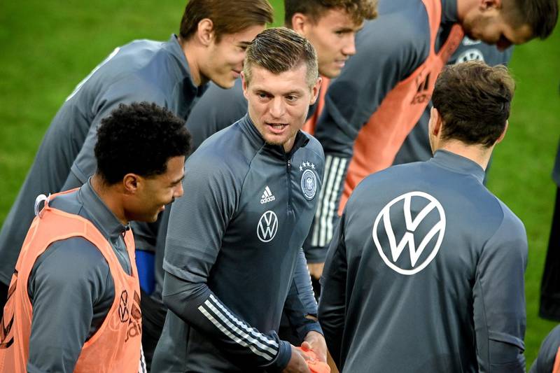 Toni Kroos (C) takes part in a training session in Cologne. EPA