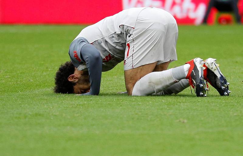 Salah celebrates scoring his first goal. Reuters