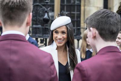 LONDON, UNITED KINGDOM - MARCH 12: Meghan Markle and Prince Harry (not pictured) meet school children in the Dean's yard before attending a Reception after attending the Commonwealth Service at Westminster Abbey on March 12, 2018 in London, England. Organised by The Royal Commonwealth Society, the Commonwealth Service is the largest annual inter-faith gathering in the United Kingdom. (Photo by Jack Hill - Pool/Getty Images)
