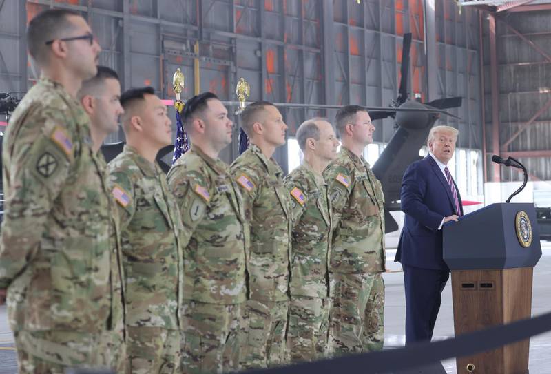 U.S. President Donald Trump speaks as he awards the Distinguished Flying Cross to seven California National Guard helicopter crewmembers during a ceremony. Reuters