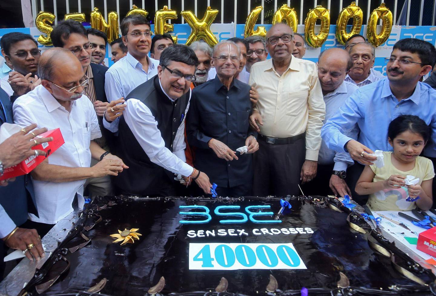 Ashishkumar Chauhan, MD and CEO of the Bombay Stock Exchange (BSE), poses as he cuts a cake to celebrate the Sensex index rising to over 40,000, in Mumbai, India, May 23, 2019. REUTERS/ Francis Mascarenhas
