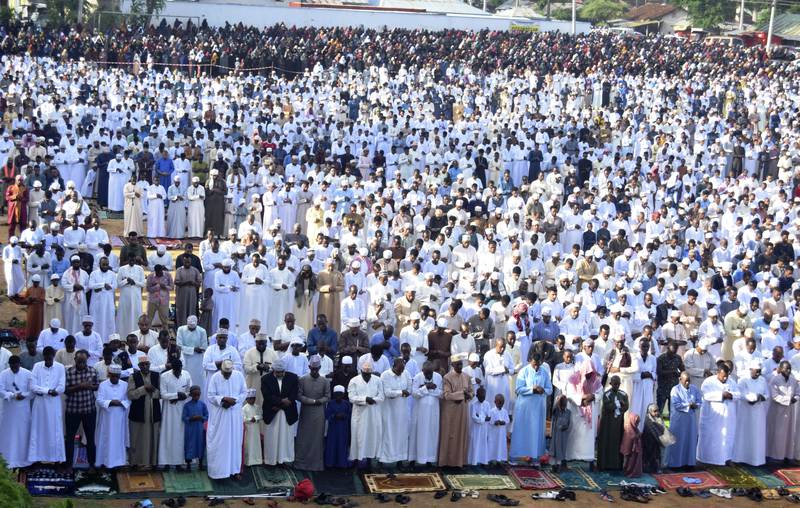 Kenyan Muslims stand for Eid prayers in Mombasa.