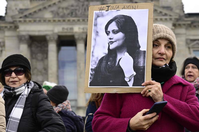 Mahsa Amini's death in Iranian custody ignited protests against mandatory hijab laws across the world, with women taking to the streets to demand their right to choose what to wear. AFP