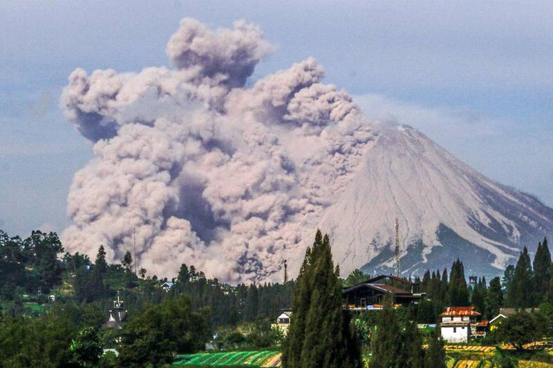 Mount Sinabung spews ash during its eruption as seen from Brastagi district in Karo, North Sumatra, Indonesia. AFP