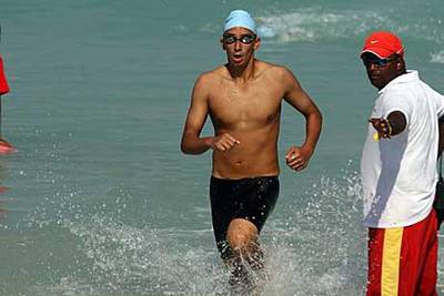 Egypt’s 15-year-old Amr Ahmed, left, may have taken in two litres of water, according to his coach.