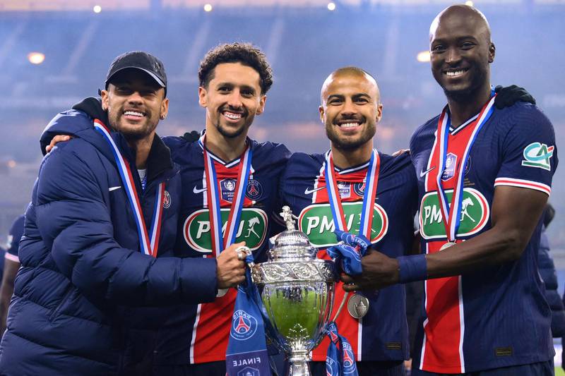 Left to right: Neymar, Marquinhos, Rafinha and Danilo Pereira celebrate with the trophy.