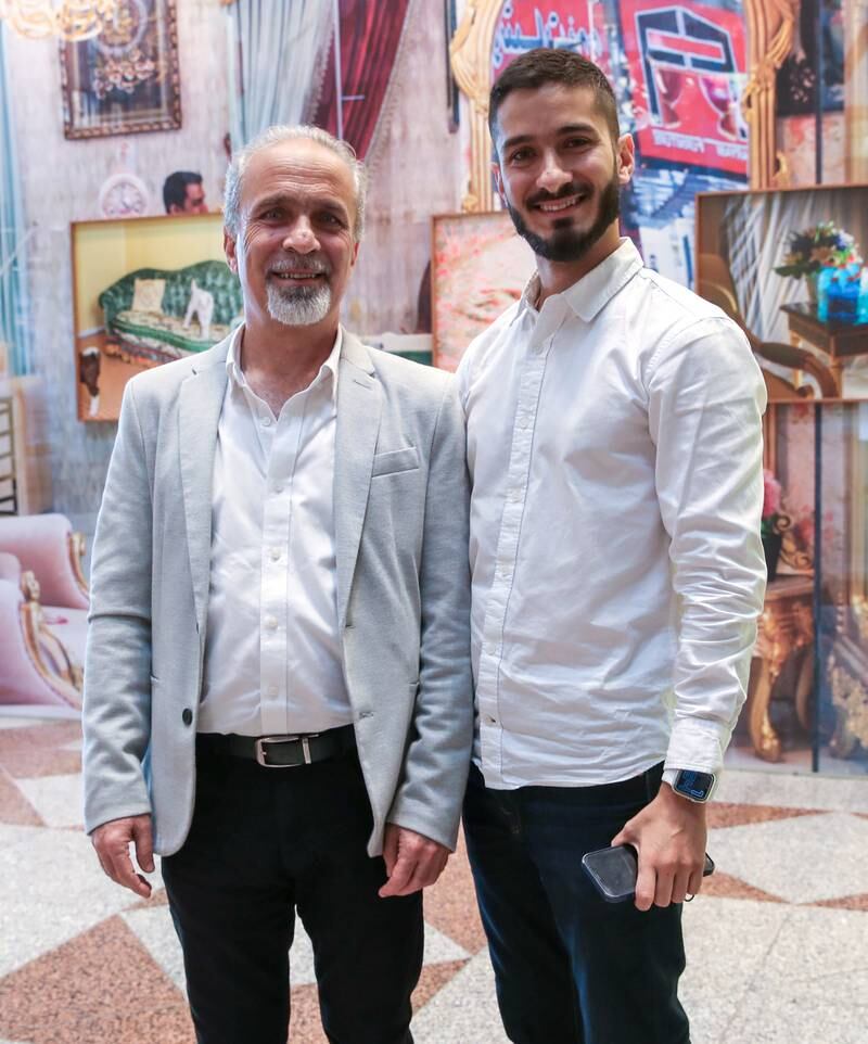 Mahmoud Hanoun, owner of Al Aqssa Sweets, with his son Mohammad at the Urban Treasures awards ceremony. Victor Besa / The National