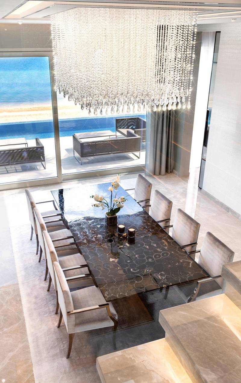 The formal dining room in the Palm Jumeirah Villa.