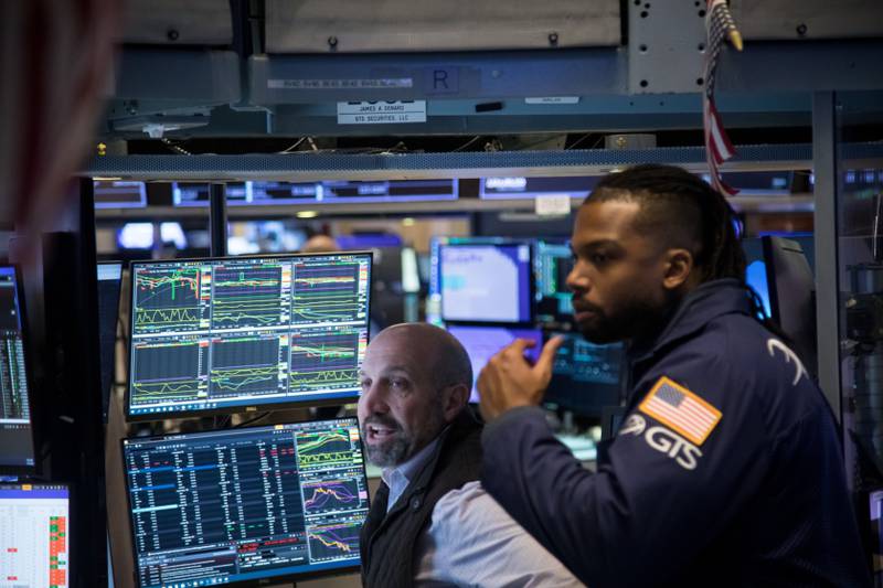 Traders on the floor of the New York Stock Exchange in New York. Brent crude is close to two-month lows as China demand concerns persist. Bloomberg