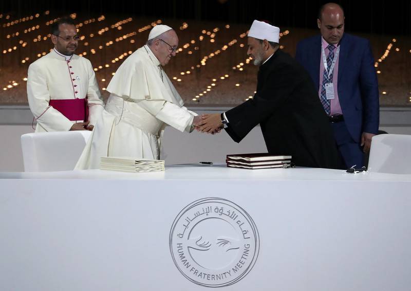 Pope Francis shakes hands with Dr Ahmad Al Tayeb. Reuters