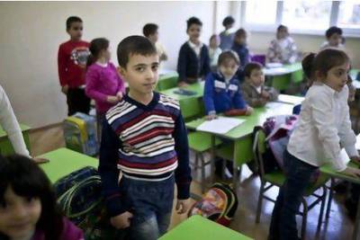 A Syrian Armenian boy at a school in Yerevan. The Armenian Education Ministry has allowed Syrian Armenian students to follow a Syrian curriculum at a state school in Yerevan.