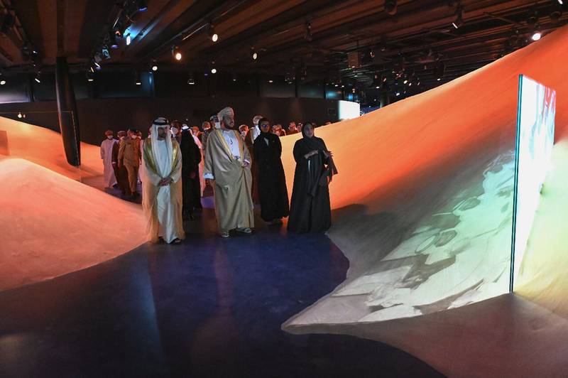 Sheikh Hamdan bin Mohammed and Asa’ad bin Tariq admire an exhibition at the UAE pavilion at Expo 2020 Dubai. Photo: @SheikhHamdan