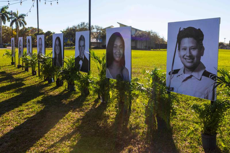 Photos of the 17 people killed during the Marjory Stoneman Douglas High School mass shooting are displayed on the fifth anniversary of the shooting in Parkland, Florida. AFP