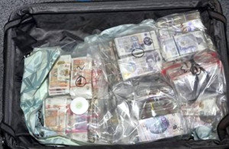 Authorities said they seized nearly £2 million stashed in five suitcases. Border Force
