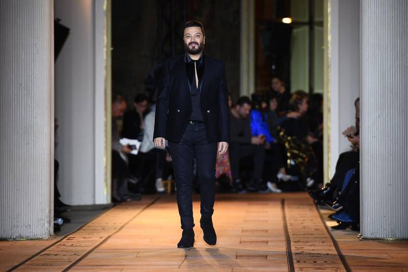 Lebanese fashion designer Zuhair Murad takes to the runway at the end of his spring / summer 2020 haute couture show in Paris, on January 22, 2020. AFP