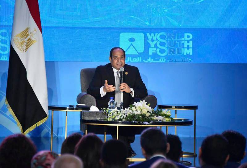 In this photo provided by Egypt's state news agency MENA, Egyptian President Abdel-Fattah el-Sissi, speaks during a youth conference in Sharm El Sheikh, Egypt, Monday, Nov. 5, 2018. Addressing the international youth conference late Sunday el-Sissi said that the 2011 Arab Spring revolt was an ill-advised attempt at change whose chaotic aftermath posed an existential threat to the nation. Egypt's president said those behind the revolt had good intentions but had inadvertently "opened the gates of hell." (MENA via AP)