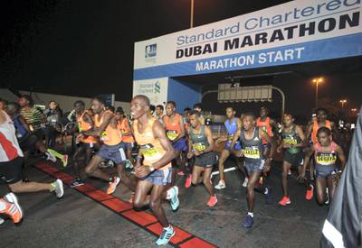 Dubai, United Arab Emirates - January 25, 2019: The elite runners start of the Standard Chartered Dubai Marathon 2019. Friday, January 25th, 2019 at Jumeirah, Dubai. Chris Whiteoak/The National