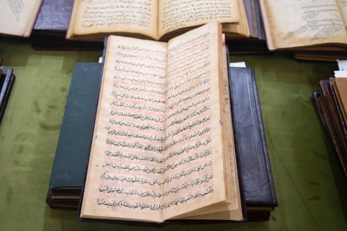 Sheikh Dr Sultan bin Muhammad Al Qasimi is a collector of historical manuscripts. Depicted is a set of manuscripts he donated to Islamic Manuscripts House of Al Qasimia University, to be studied by researchers and specialists. Photo: WAM
