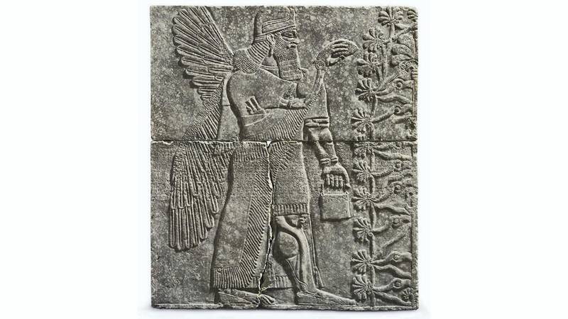 An Assyrian gypsum relief of a Winged Genius.Reign of Ashurnasirpal II, circa 883-859 BC.
