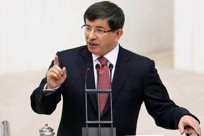 Turkey's foreign minister Ahmet Davutoglu says a security zone could be erected as a reaction ‘against terrorism or a big flow or refugees’ into Turkey.