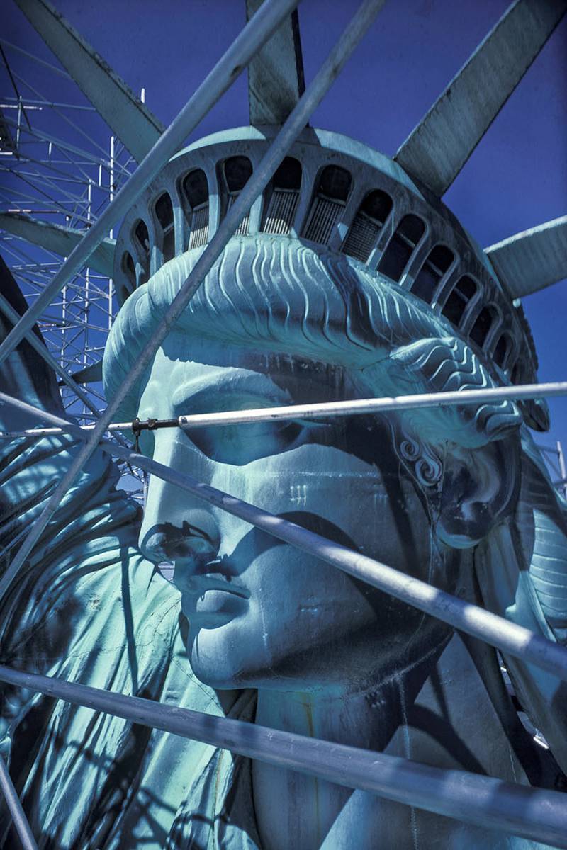 The Statue of Liberty being repaired for her 100th Anniversary, in New York City
Photo: Frank Fournier/ Xposure Photo Festival