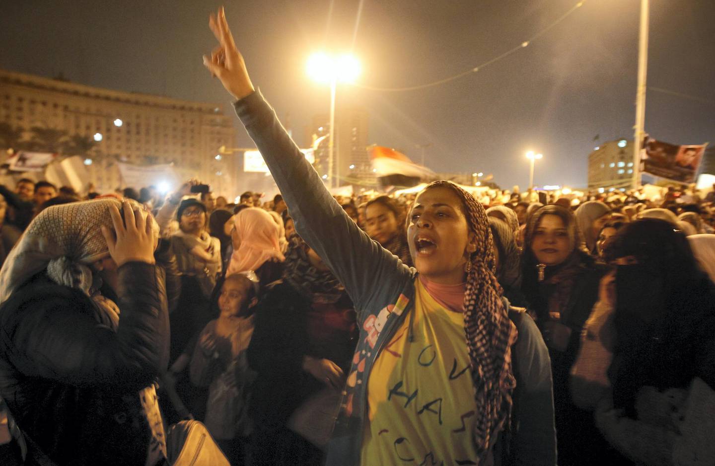Egyptian women join a mass protest in Cairo's Tahrir square on November 24, 2011, as members of Egypt's ruling military council rejected calls to step down immediately, saying it would amount to a "betrayal" as anti-military protests entered their seventh day.  AFP PHOTO/MAHMUD HAMS (Photo by MAHMUD HAMS / AFP)